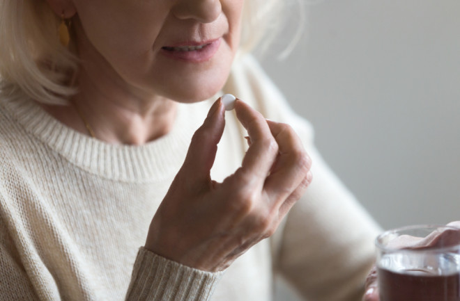 Taking Aspirin - Shutterstock