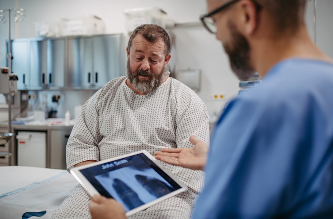 lung cancer patient talking to doctor