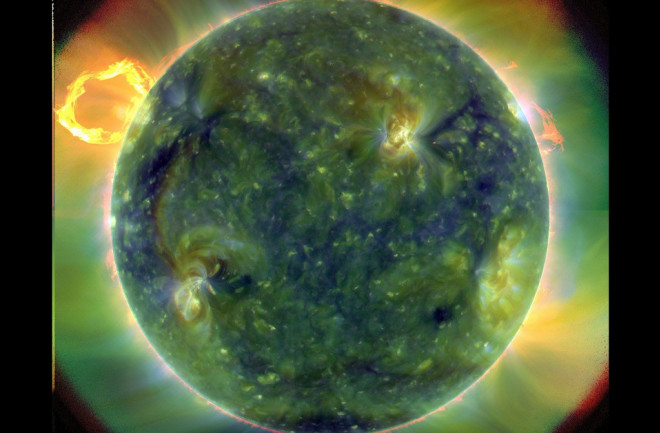 the sun in green and yellow - NASA