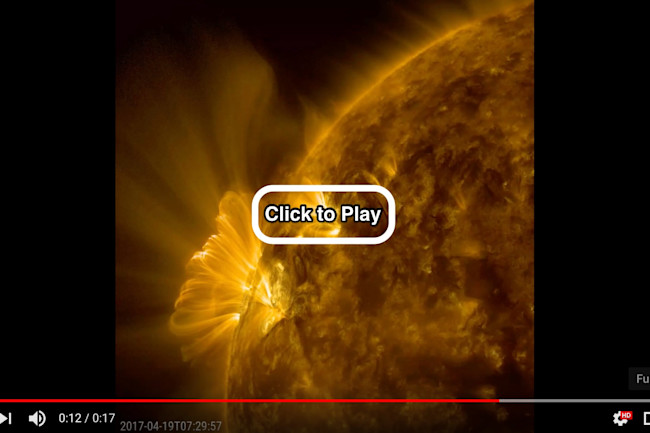 21__Gargantuan_arcing_loops_of_glowing_plasma_on_the_Sun_-_YouTube.jpg