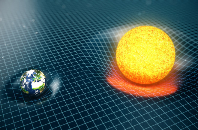 гравитация земля солнце форма вселенной - Shutterstock