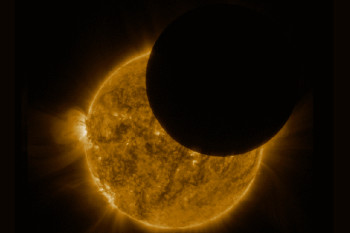A Solar Eclipse, as Seen by a Spacecraft Orbiting 22,000 Miles Away