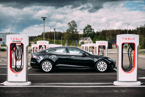 Tesla Car Charging - Shutterstock