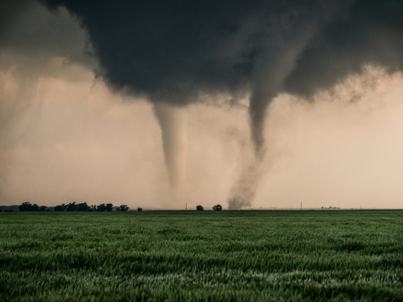 A pair of tornadoes take a destructive path through northern Oklahoma farmyards near Cherokee