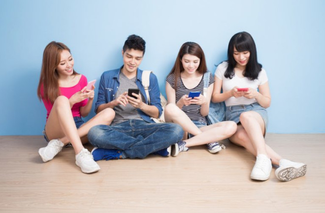 Screen Time Smart Phones Teenagers - Shutterstock