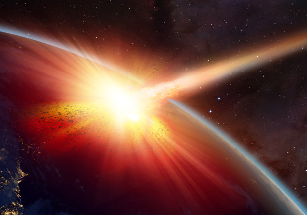 comet asteroid hitting planet earth in space - shutterstock