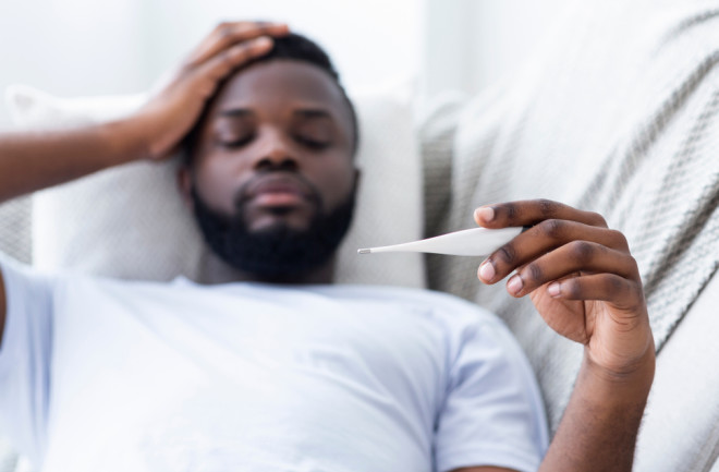 flu or covid-19 fever - shutterstock