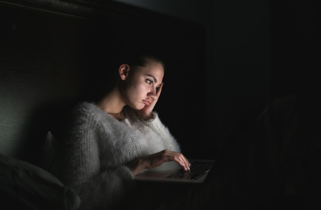 woman staying up at night - shutterstock 1153179532