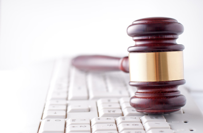 gavel on a keyboard courtroom AI - shutterstock