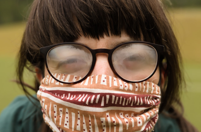 Person wearing a mask and fogged glasses - Shutterstock