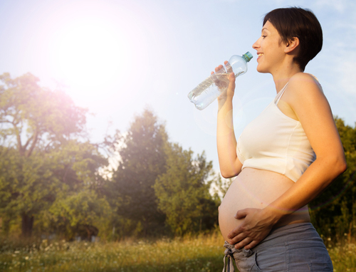 pregnant-woman-drinking-water.jpg