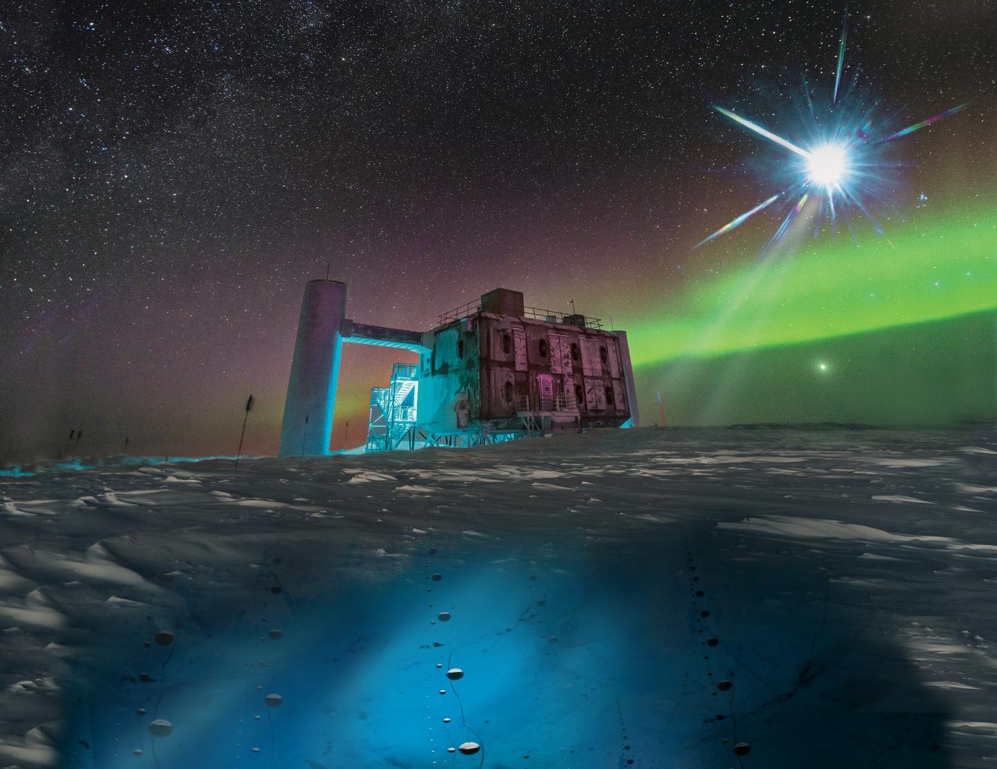 This image combines a real photograph of the IceCube Lab in Antarctica with an artist's rendering of the project's sensors deep below the ice and the distant blazar from which a neutrino has been detected. (Credit: IceCube/NSF)