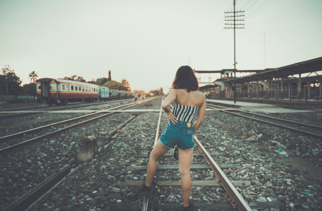 Woman on train tracks 