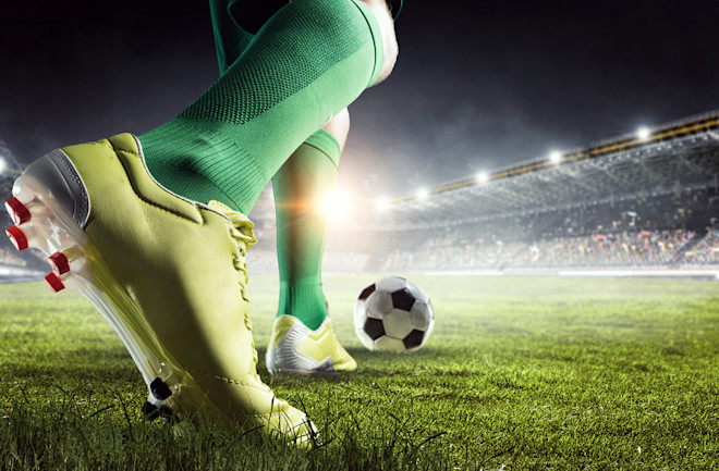 soccer ball kick closeup - shutterstock 652647784