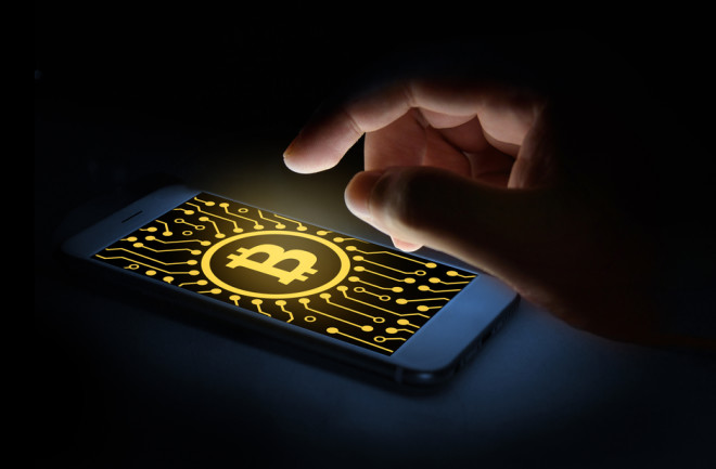 bitcoin person touching smartphone