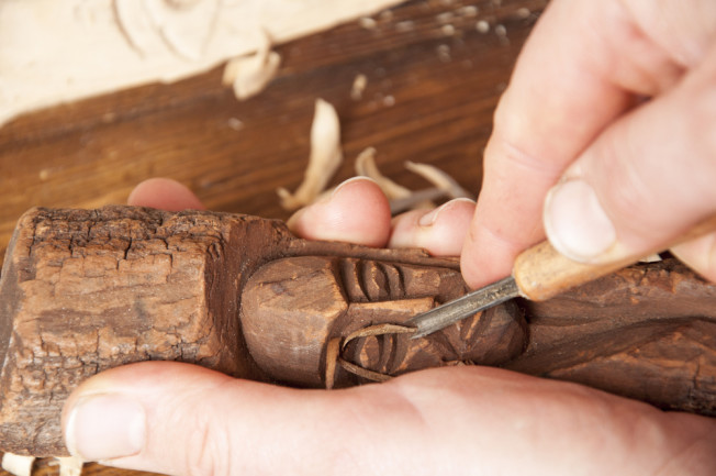 Wood working hand carving - shutterstock