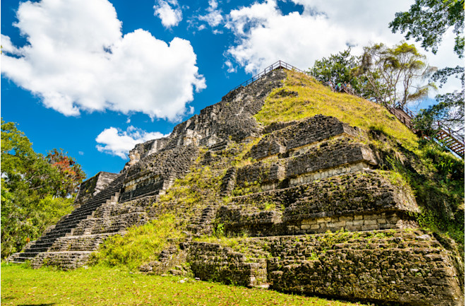 Ancient Temple at Tikal in Guatemala. The sophisticated structures and buildings of Tikal are buried under thick blankets of dirt and vegetation