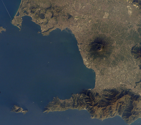 The Bay of Naples in Italy, with the Campi Flegrei to the north (top) and Vesuvius to the east (right). Image taken 2002, NASA.