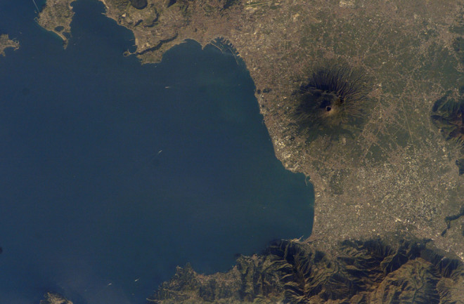 The Bay of Naples in Italy, with the Campi Flegrei to the north (top) and Vesuvius to the east (right). Image taken 2002, NASA.