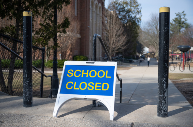 School closed sign playground covid lockdown - shutterstock