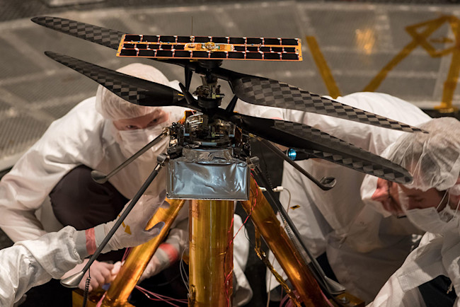 Testing a flight model of the Ingenuity helicopter at JPL's Space Simulator. Working out the engineering here on Earth was the hard part. (Credit: NASA/JPL-Caltech)
