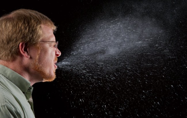sneezing coughing man mist Creative Commons