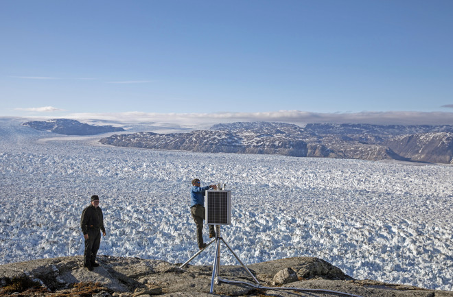 Researchers on Helheim Glacier - Reuters
