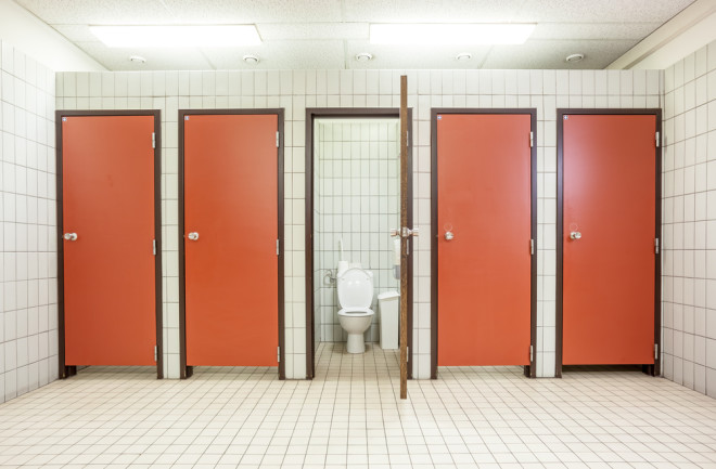 public restroom red doors - shutterstock