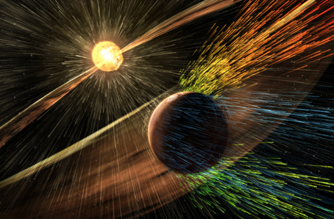 An artist’s rendering of Mars getting bombarded by a solar storm. (Credit: NASA:GSFC)