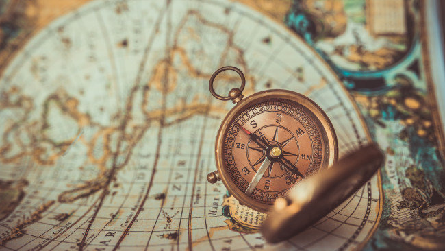 Compass and map - Shutterstock