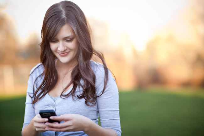 tweeting-phone-sunset.jpg