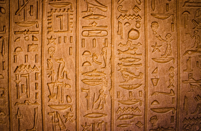 Egyptian hieroglyphics - shutterstock 1686830842