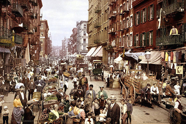 people in streets of new york city a century ago