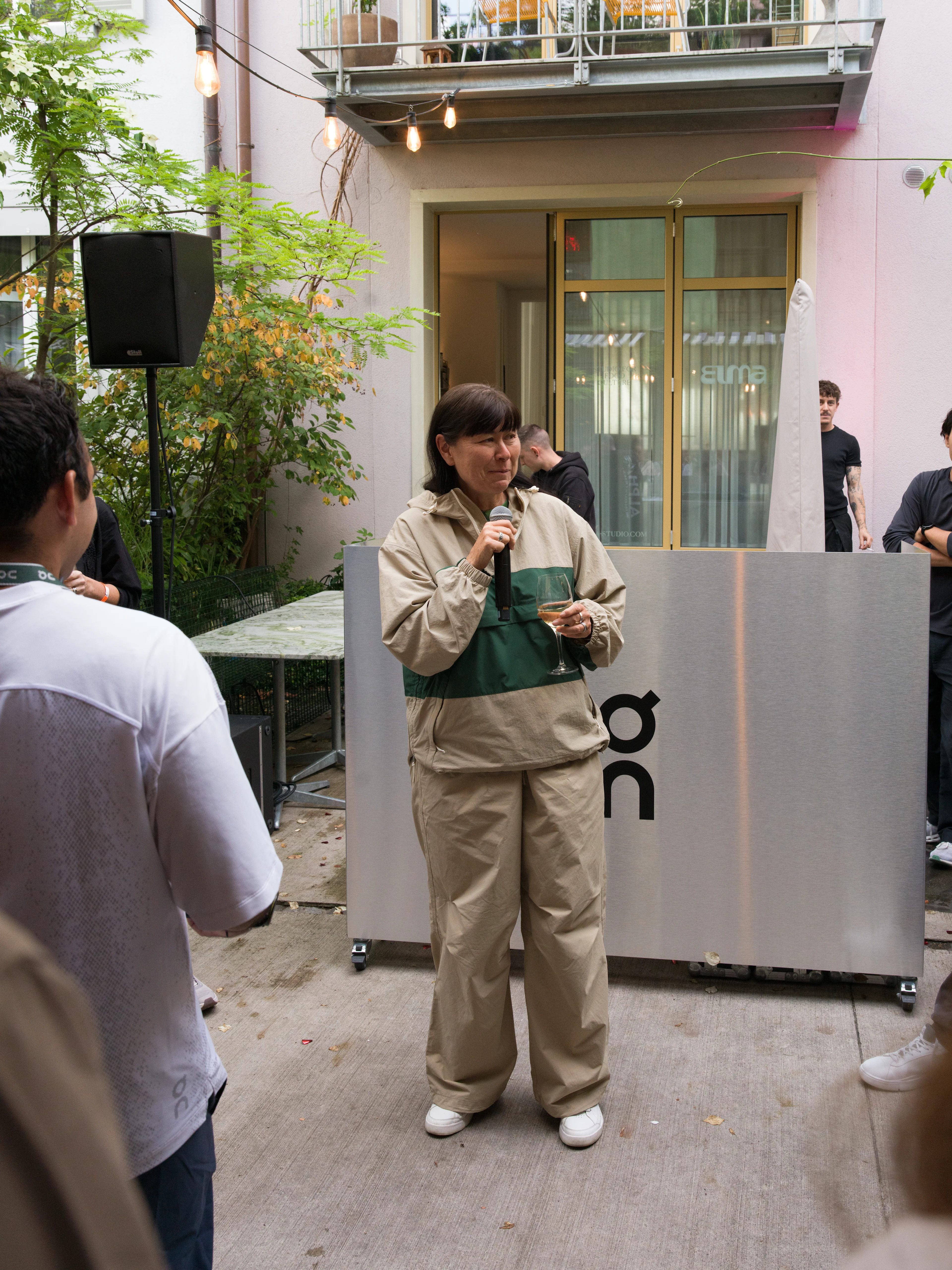 A woman speaking to a crowd