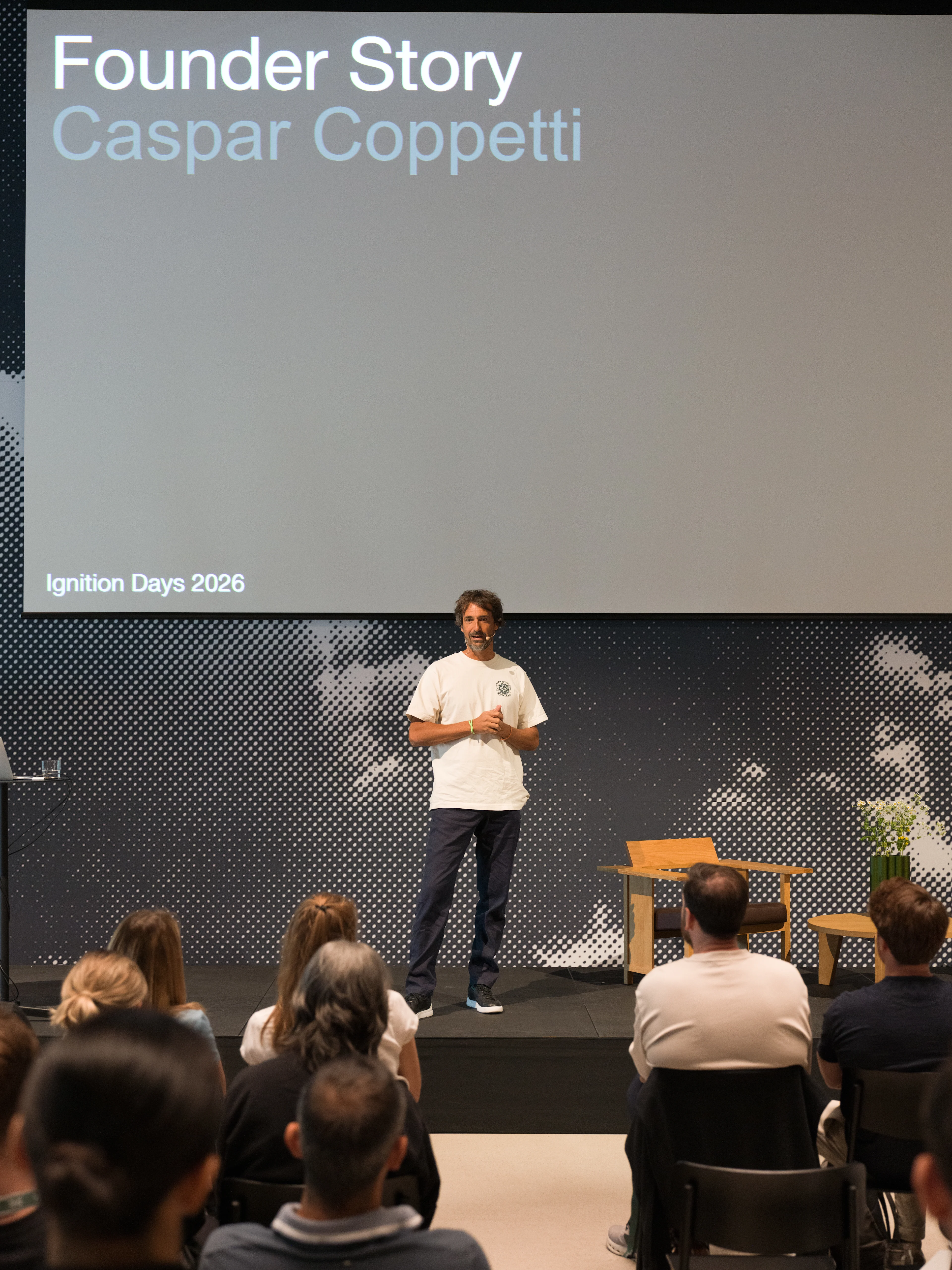 On Founder stands on stage