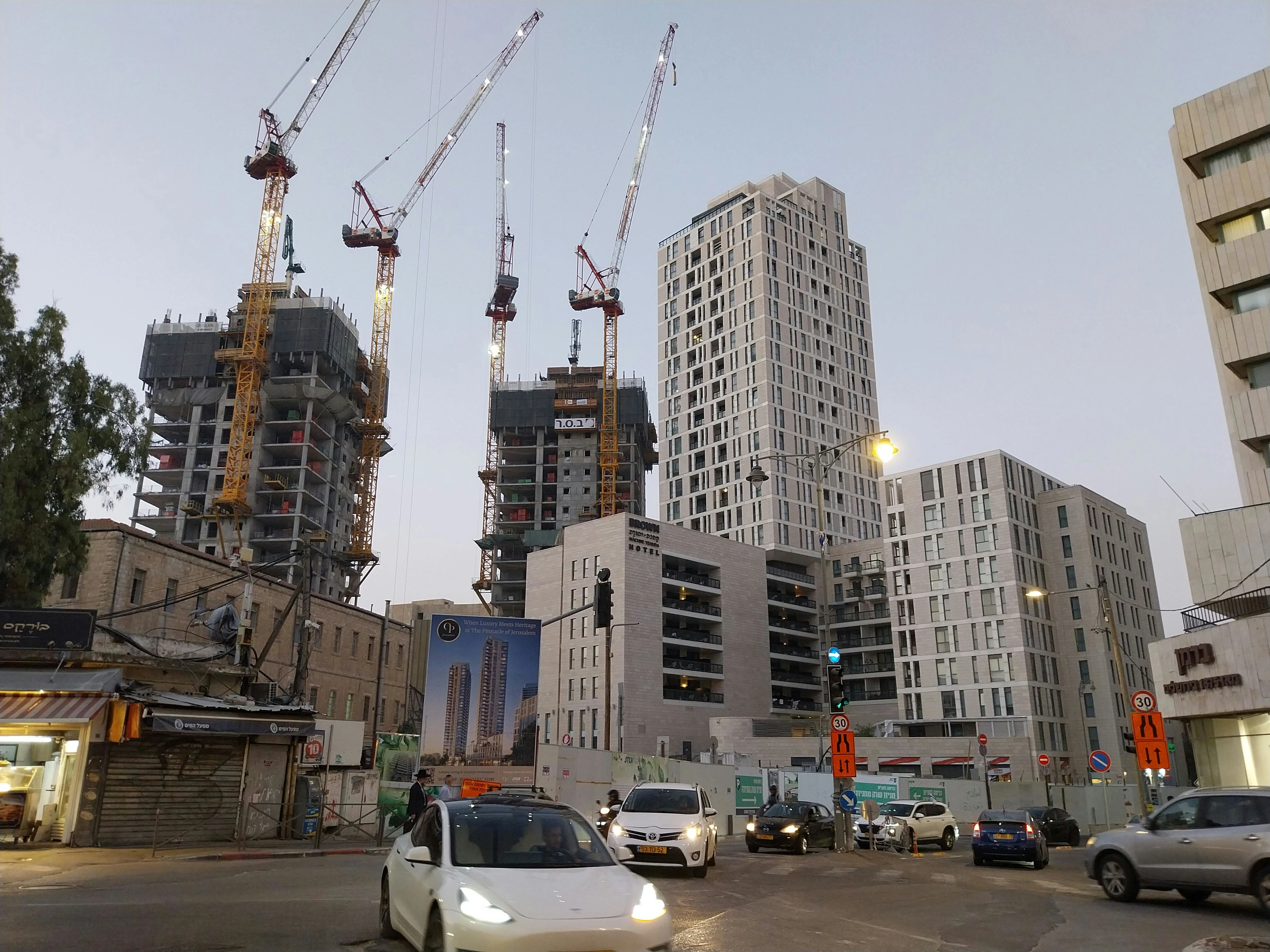 High rises near the Mahane Yehuda market in Jerusalem seen at dusk. Photo: Author.