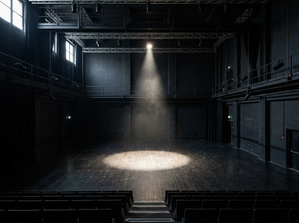 An empty black-box theatre, perfect for a stand-up comedy Edinburgh show.