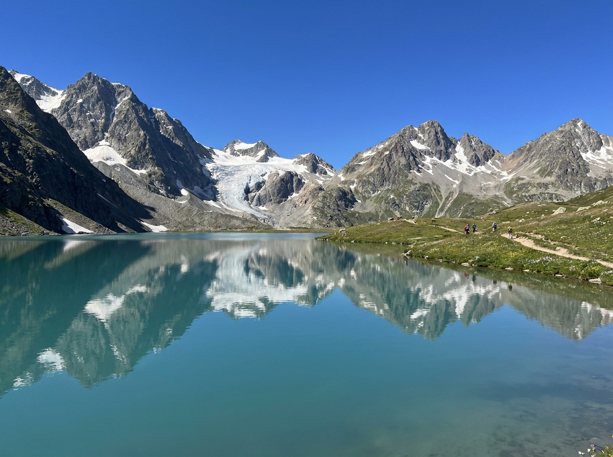 A clear alpine lake reflecting mountains, representing clear management for hiking events.
