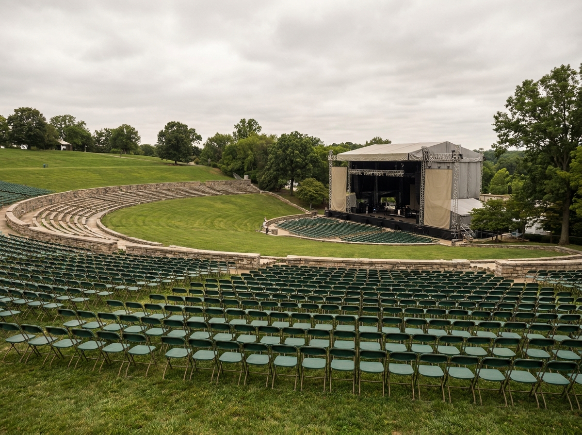 An empty outdoor amphitheater prepared for a large state-sponsored event.