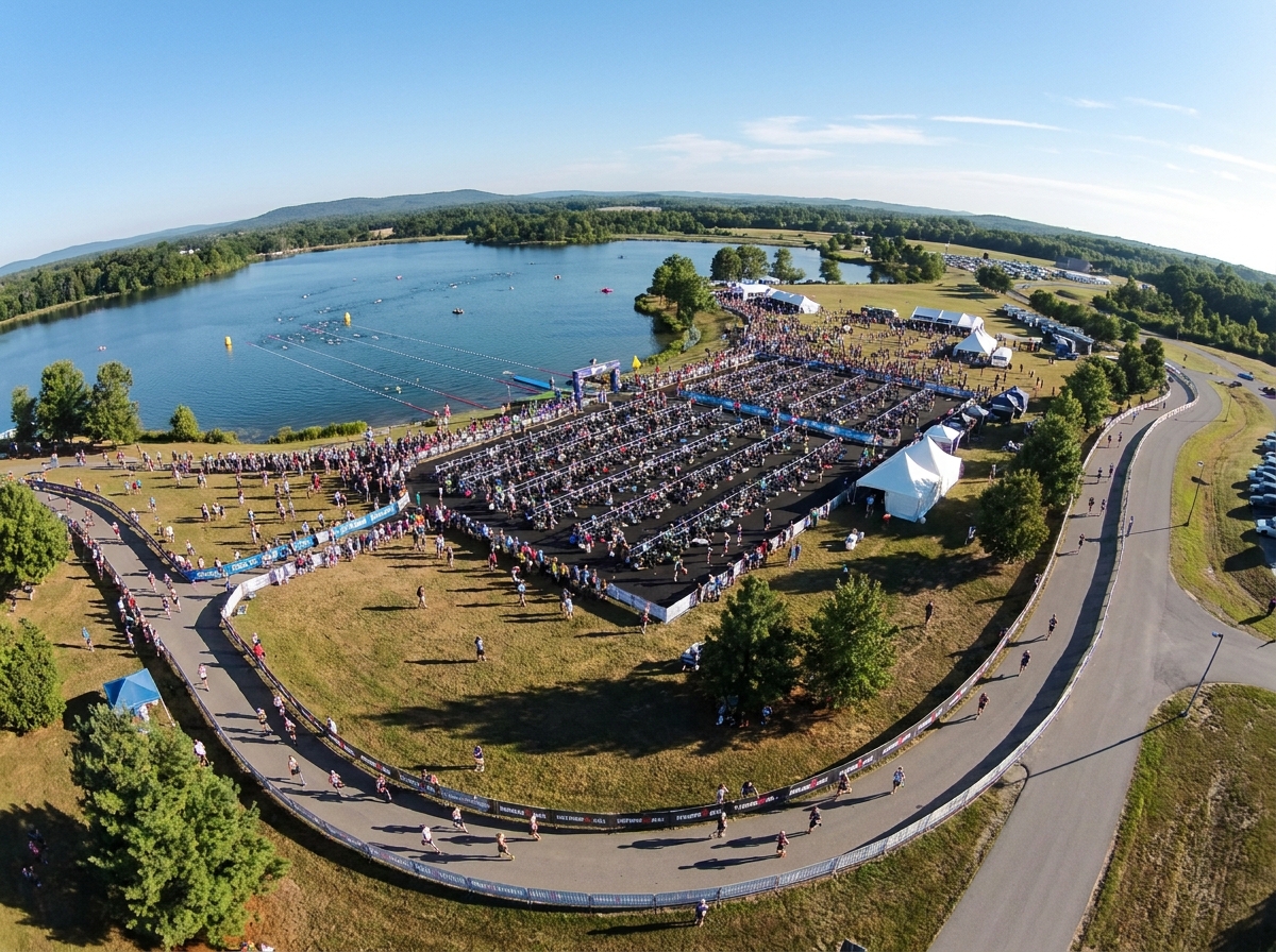 An aerial view of a large-scale triathlon event showcasing the different race areas.