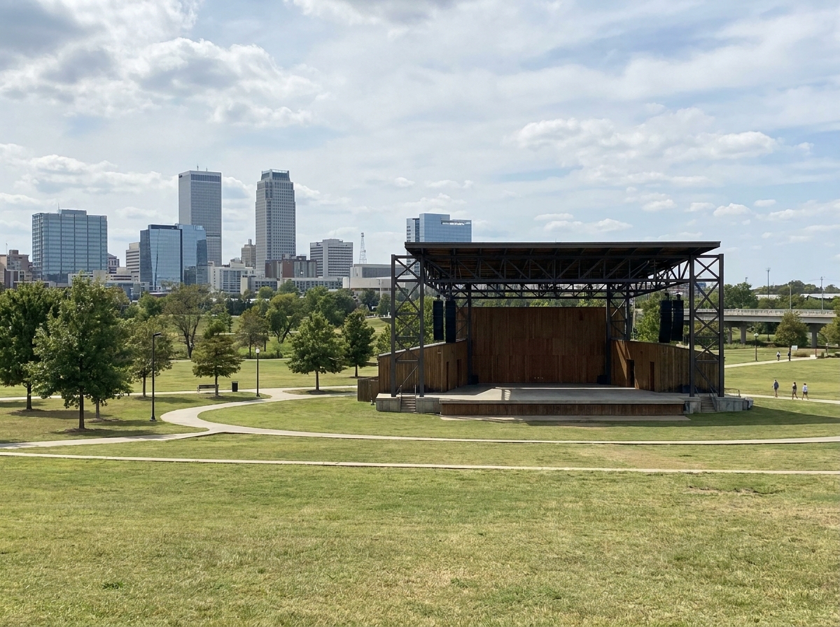 Outdoor festival stage set up for a community event at a park in Tulsa.