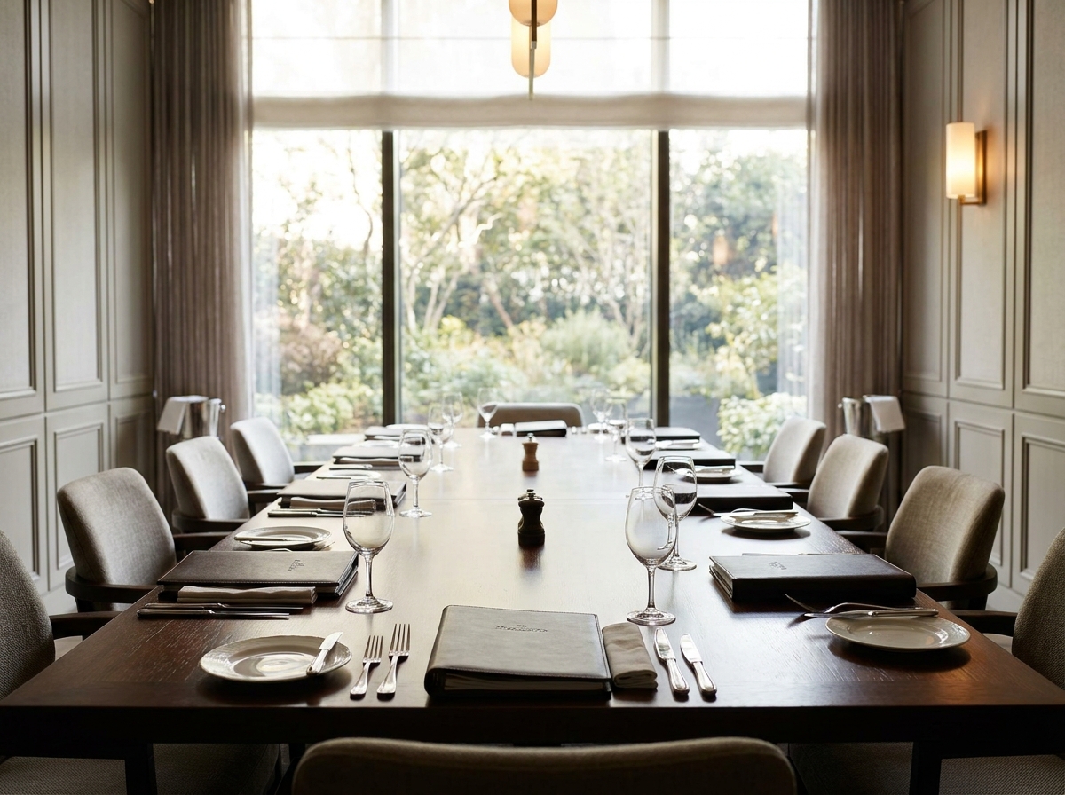 A private dining room table set for an exclusive networking dinner.