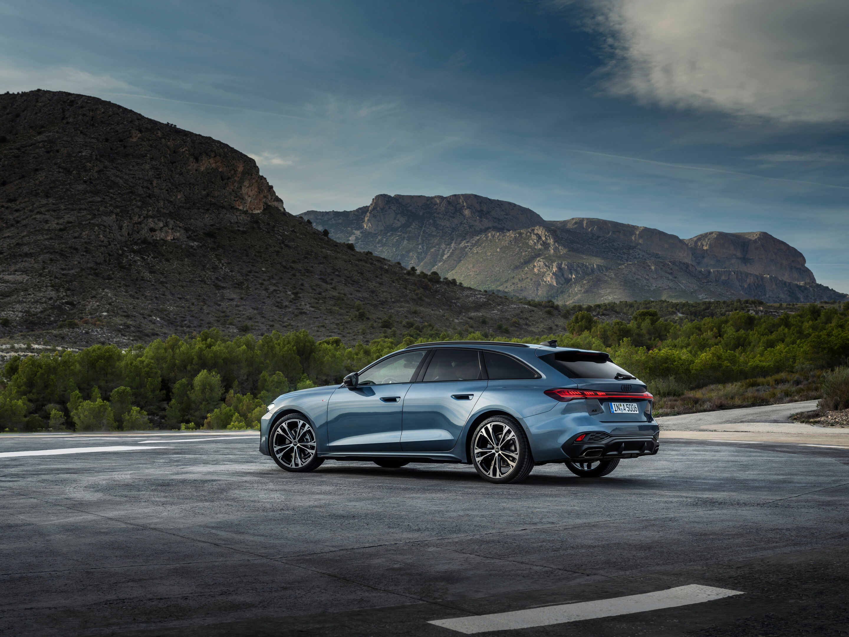 Audi A5 Avant, three-quarter rear, static press photo. Audi MediaCenter, editorial use.