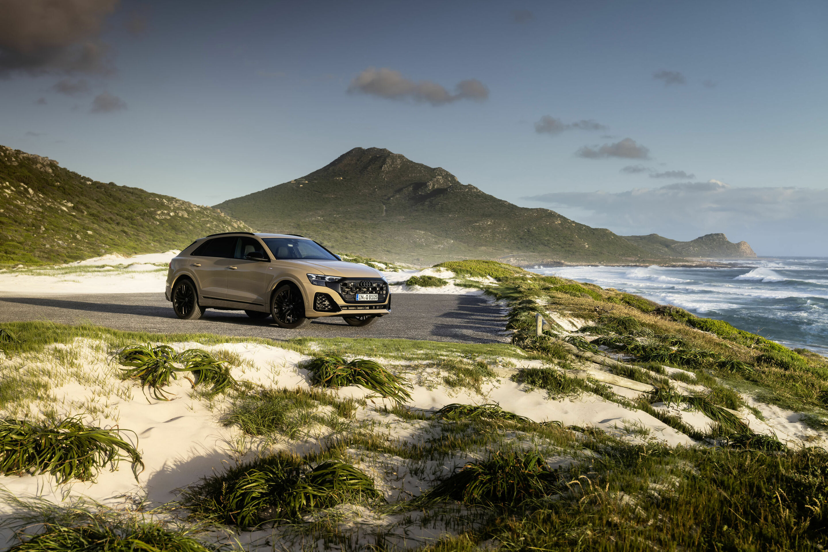 Audi Q8 (current gen) side, coastal. Source: Audi MediaCenter A236005.