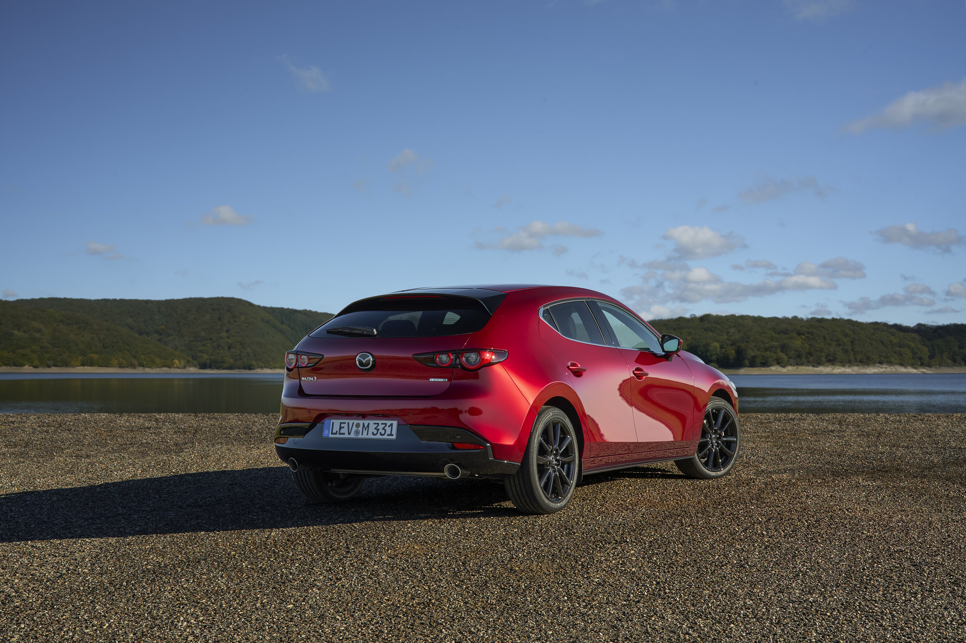 Source: https://www.mazda-press.com/de/cars/mazda3/ — press image, editorial use. Run: 2026-08-24