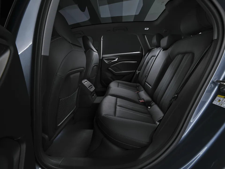 Audi A5 Avant, rear bench with doors open. Audi MediaCenter, editorial use.