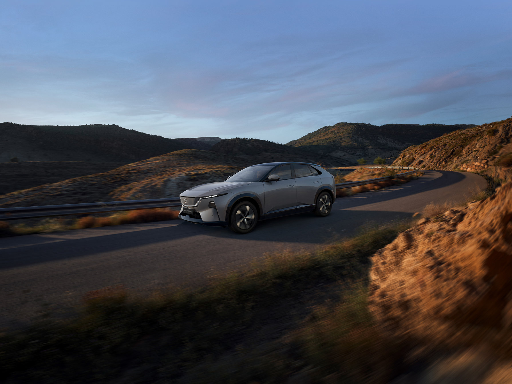 Source: https://www.mazda-press.com/de/cars/mazda-cx-6e/ — press image, editorial use. Run: 2026-08-24