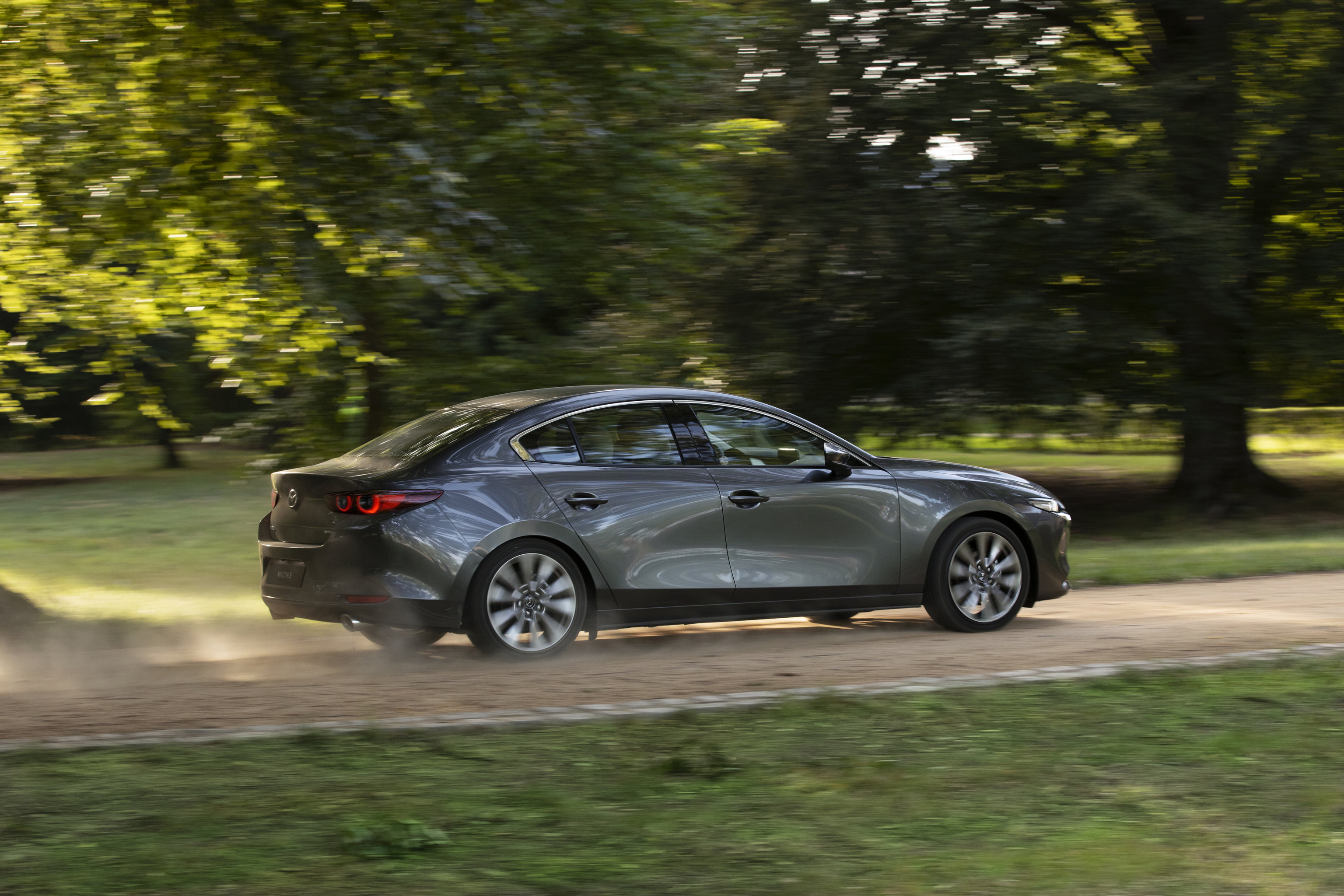 Source: https://de.mazda-press.com/cars/mazda3/ — press image, editorial use. Body verified visually as sedan (the German portal mislabels this asset "Fastback"; Mazda AT/PT label it "Sedan"). Run: 2026-09-18
