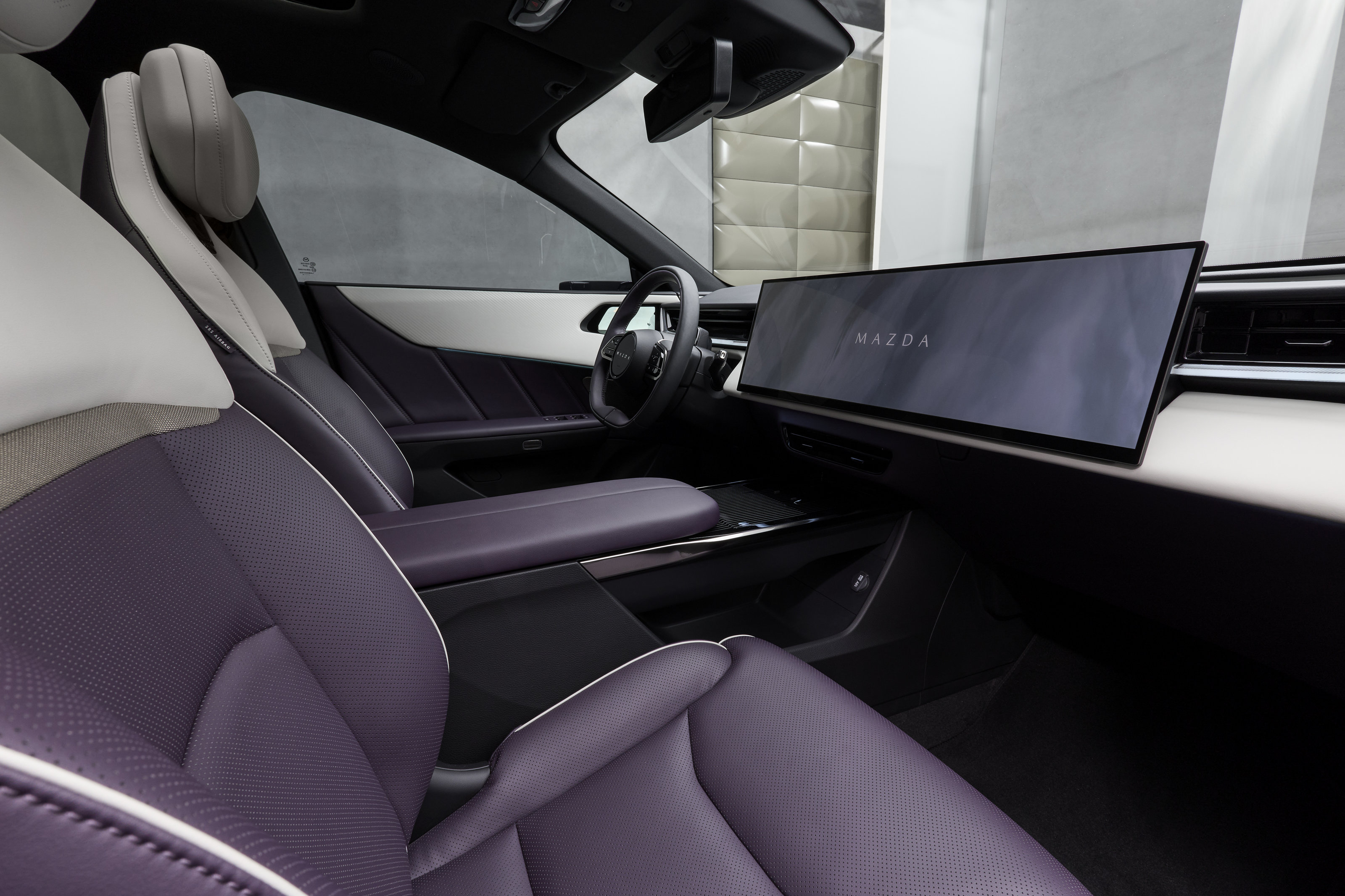 Source: https://www.mazda-press.com/de/cars/mazda-cx-6e/ — press image, editorial use. Run: 2026-08-24