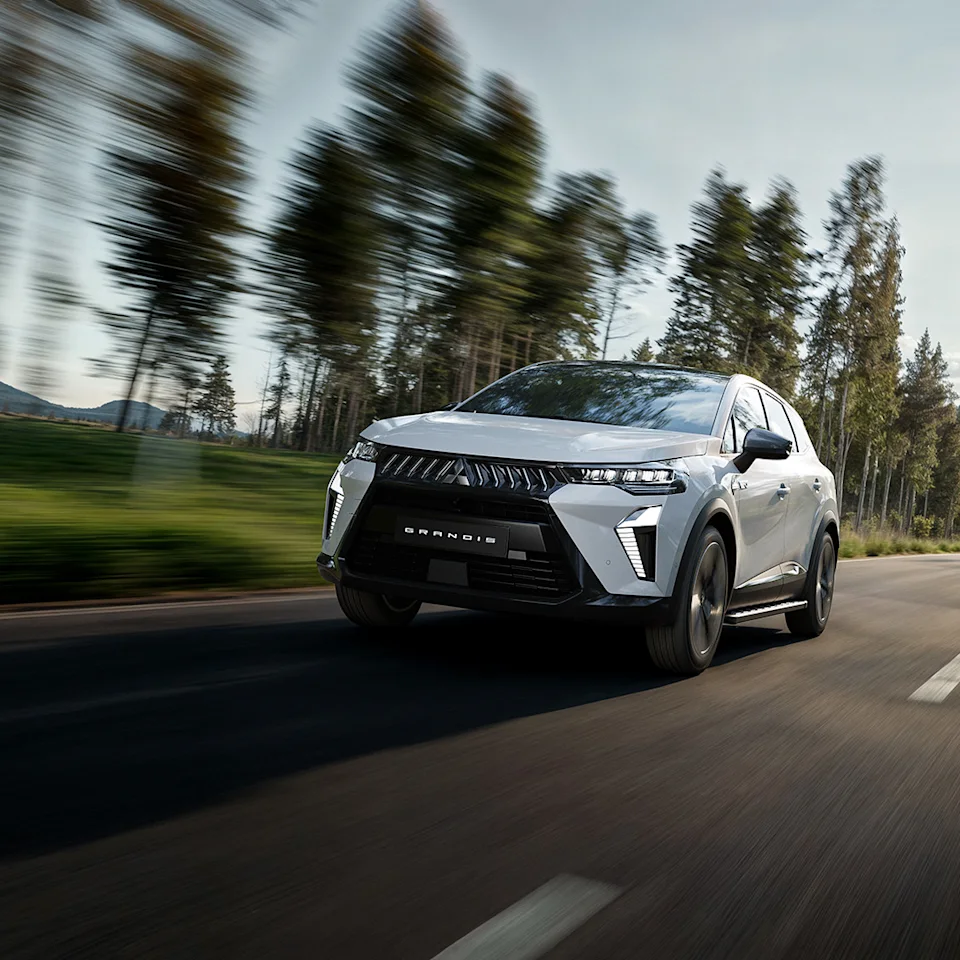 Source: https://www.mitsubishi-motors.se/wp-content/uploads/2026/04/MY2025_GRANDIS_Make-the-Grandis-more-you_1080x1080.jpg (Wismo, Swedish importer) — OEM image, editorial use. Run: 2026-10-06